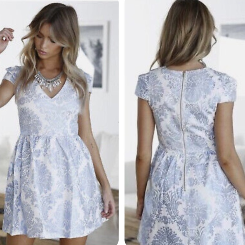 Xenia Boutique cap sleeved mini party dress in white cotton with blue foil print
